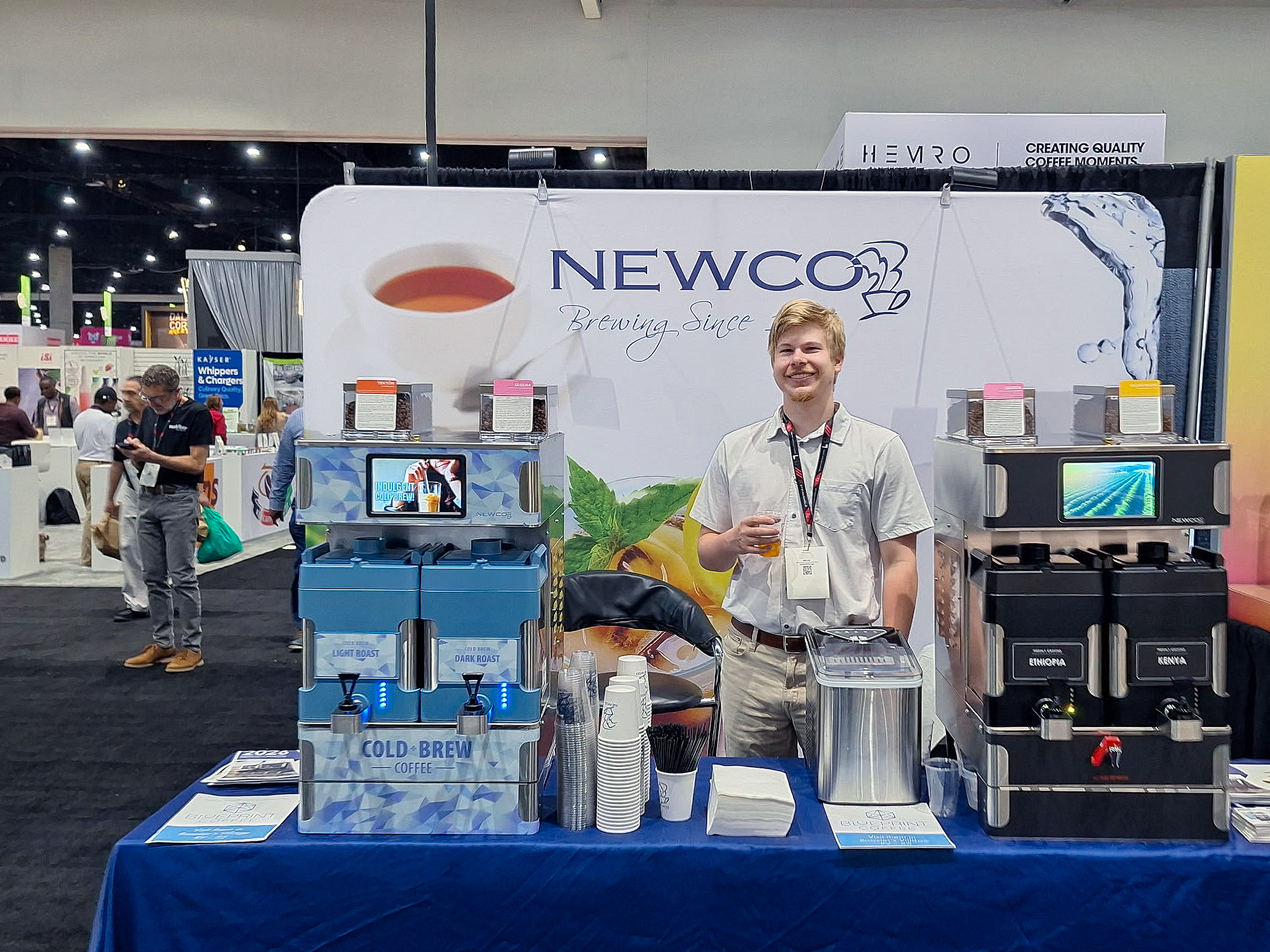 Drake SCA Booth Drake stands at the Newco booth, in between the hot and cold brew producing Infinibrews.