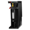 A tall, black coffee brewer